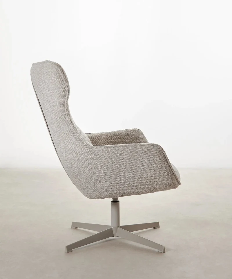 Sillón tapizado en tela bouclé Elsa