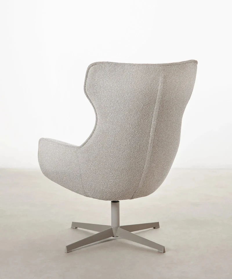 Sillón tapizado en tela bouclé Elsa