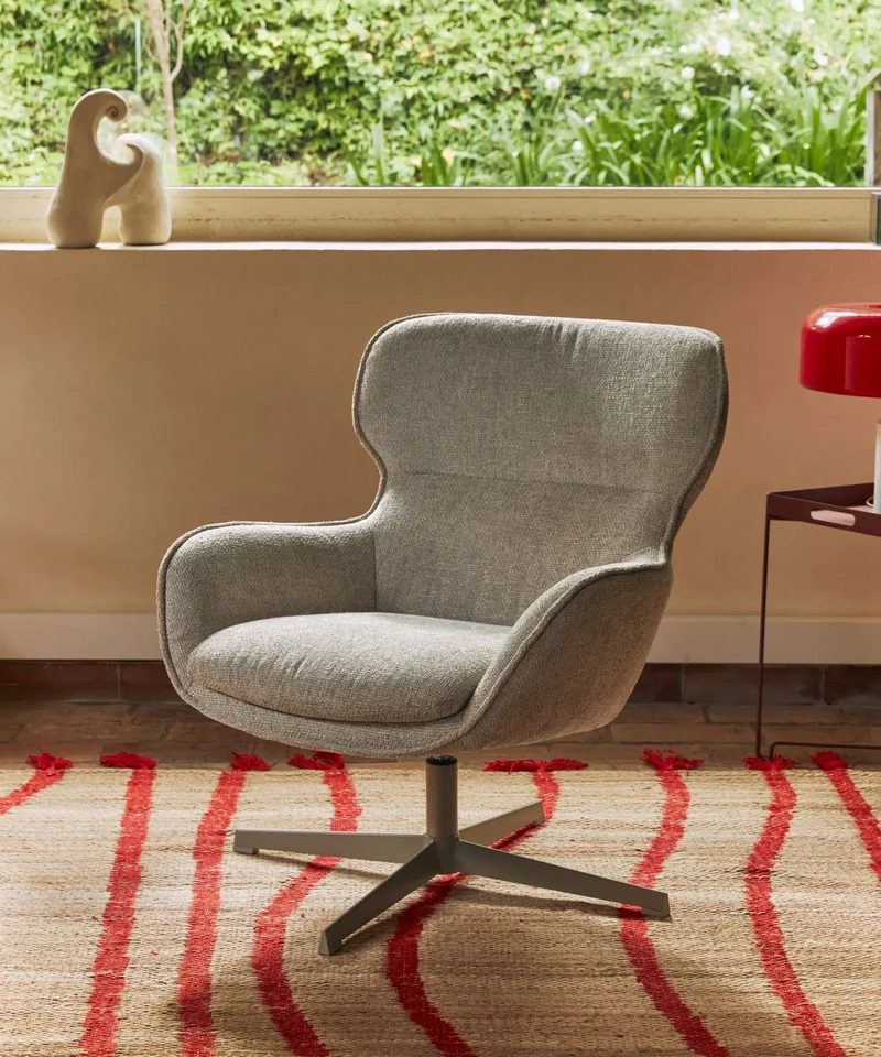 Sillón giratorio en tejido suave Norden