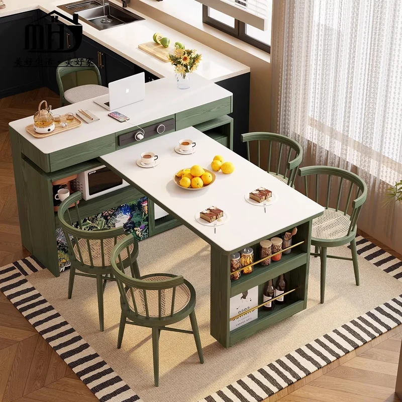 Îlot de cuisine avec plateau en pierre frittée et table pivotante à 180°