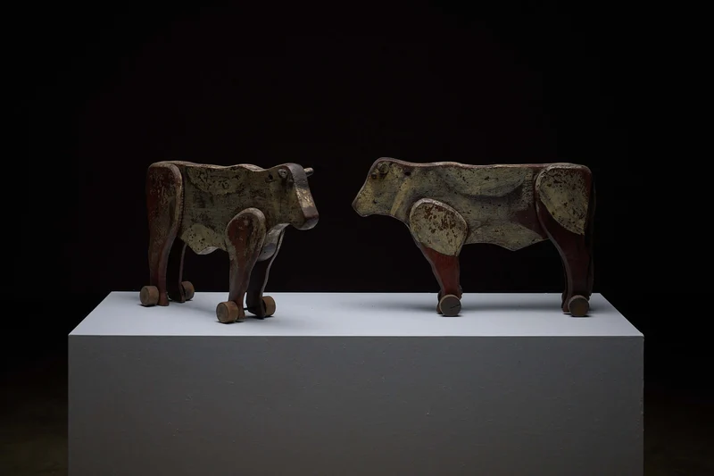 Pair of Antique Articulated Wooden Cow Pull Toys