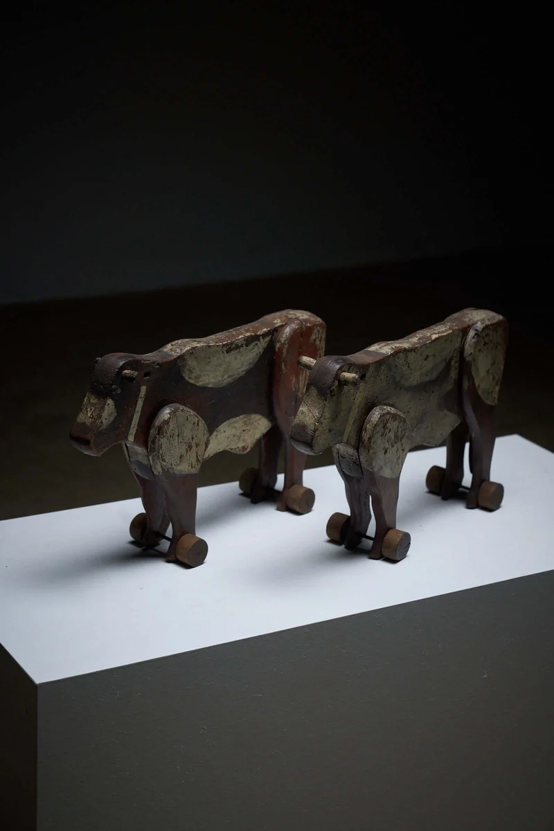 Pair of Antique Articulated Wooden Cow Pull Toys