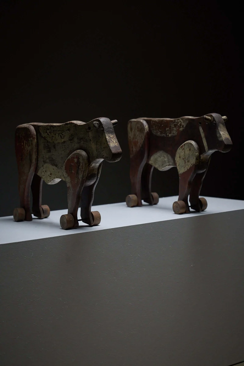 Pair of Antique Articulated Wooden Cow Pull Toys