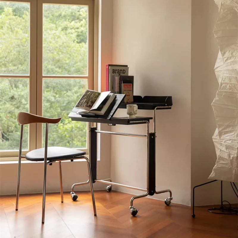 Bureau relevable et réglable avec roulettes universelles