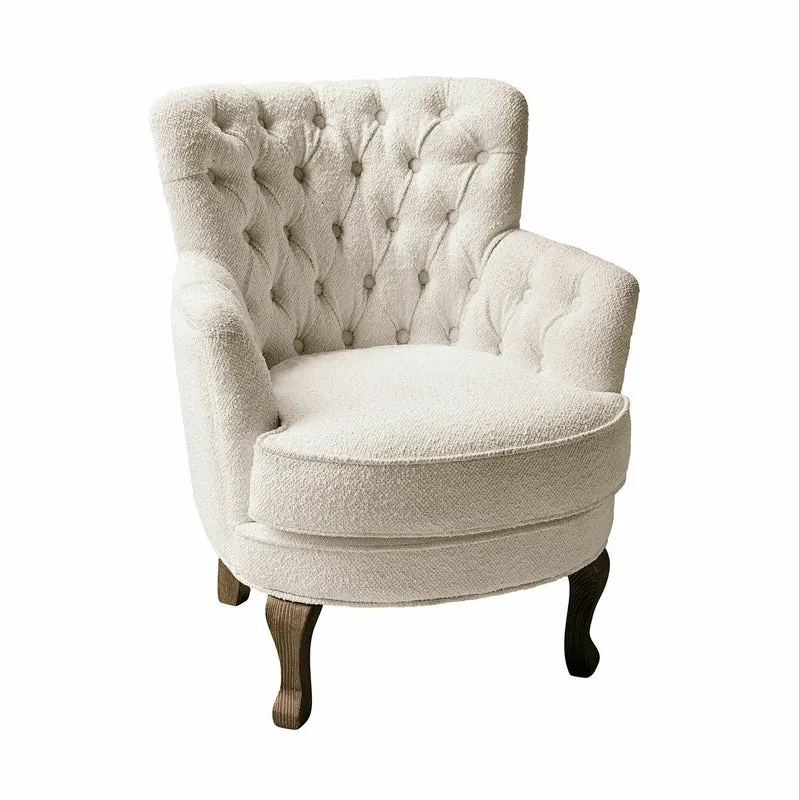 Fauteuil capitonné LOBERON Calgary en tissu bouclette crème