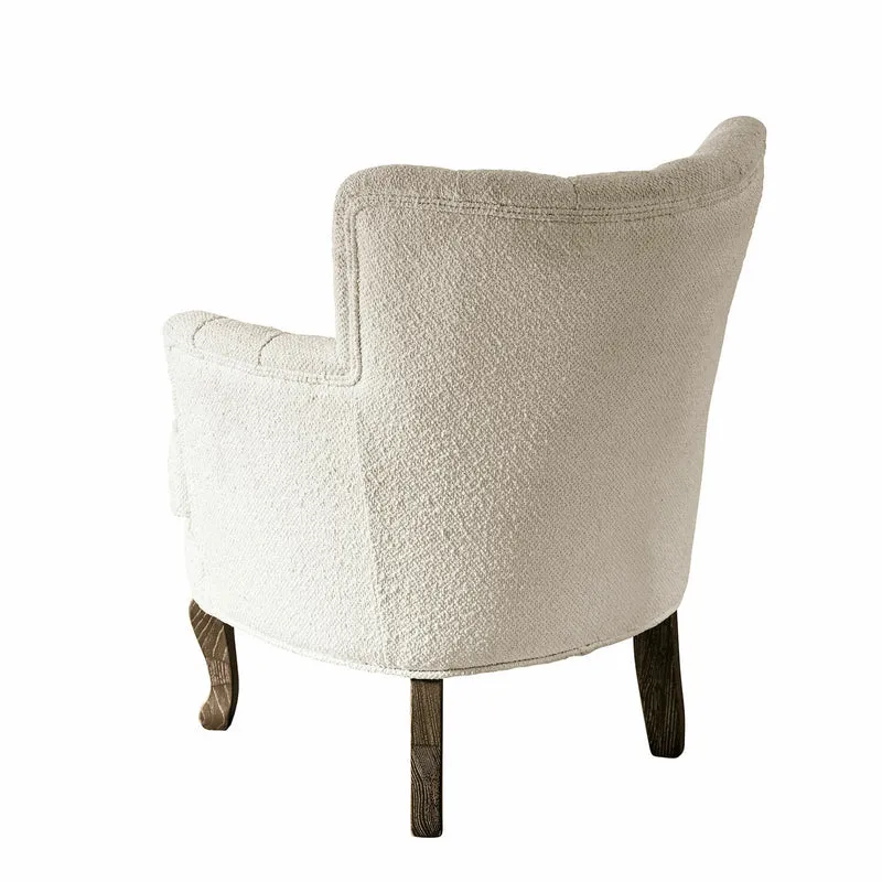 Fauteuil capitonné LOBERON Calgary en tissu bouclette crème