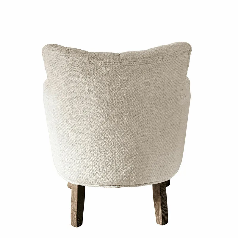 Fauteuil capitonné LOBERON Calgary en tissu bouclette crème