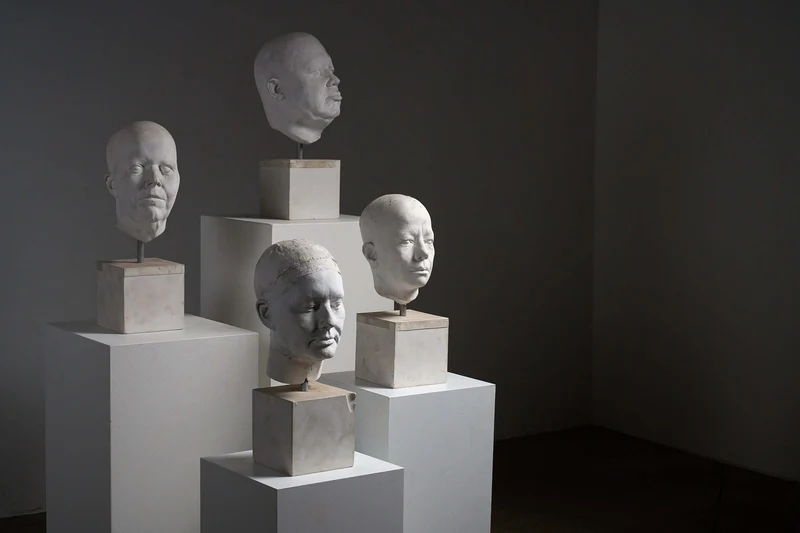 Set of Four Plaster Heads on Plinths