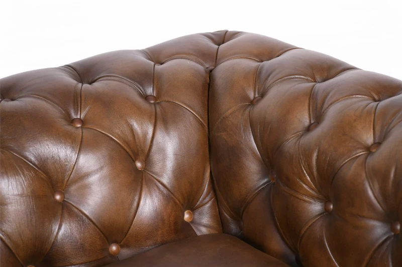 Fauteuil Chesterfield en cuir Cigare