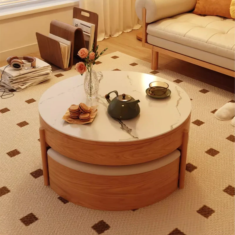 Table basse ronde à plateau relevable avec rangement et repose-pieds