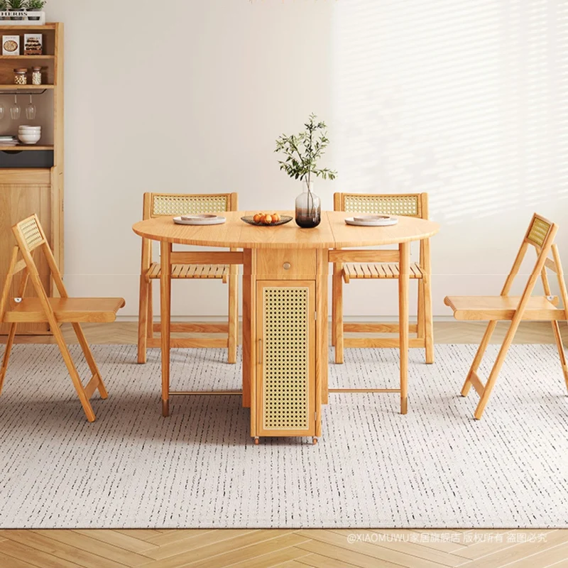 Table ronde à double abattant avec 4 chaises pliantes