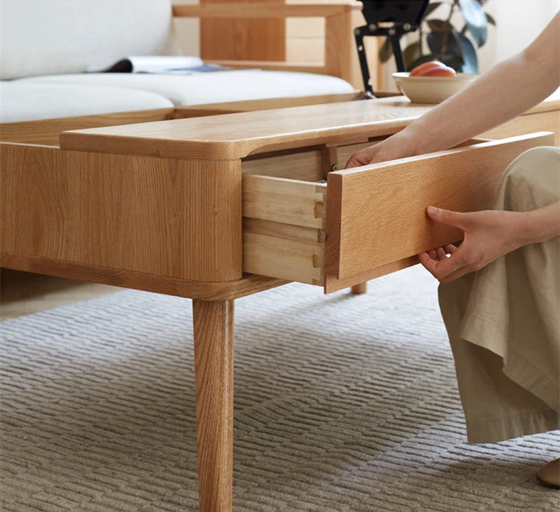 Table basse à plateau relevable en bois massif avec tiroirs et compartiments de rangement cachés