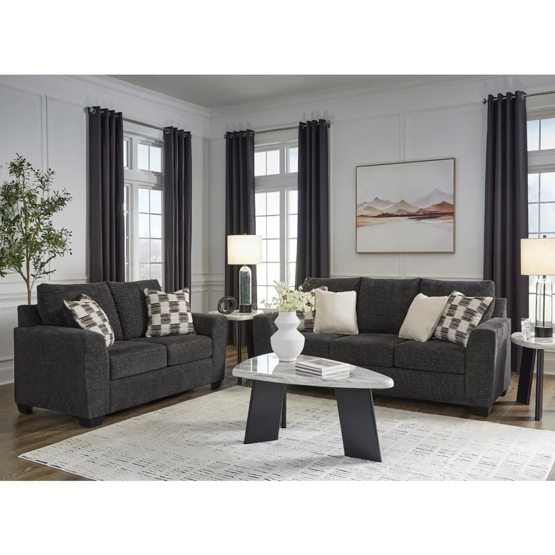 Sofa en tissu noir ébène avec coussins - Loreo
