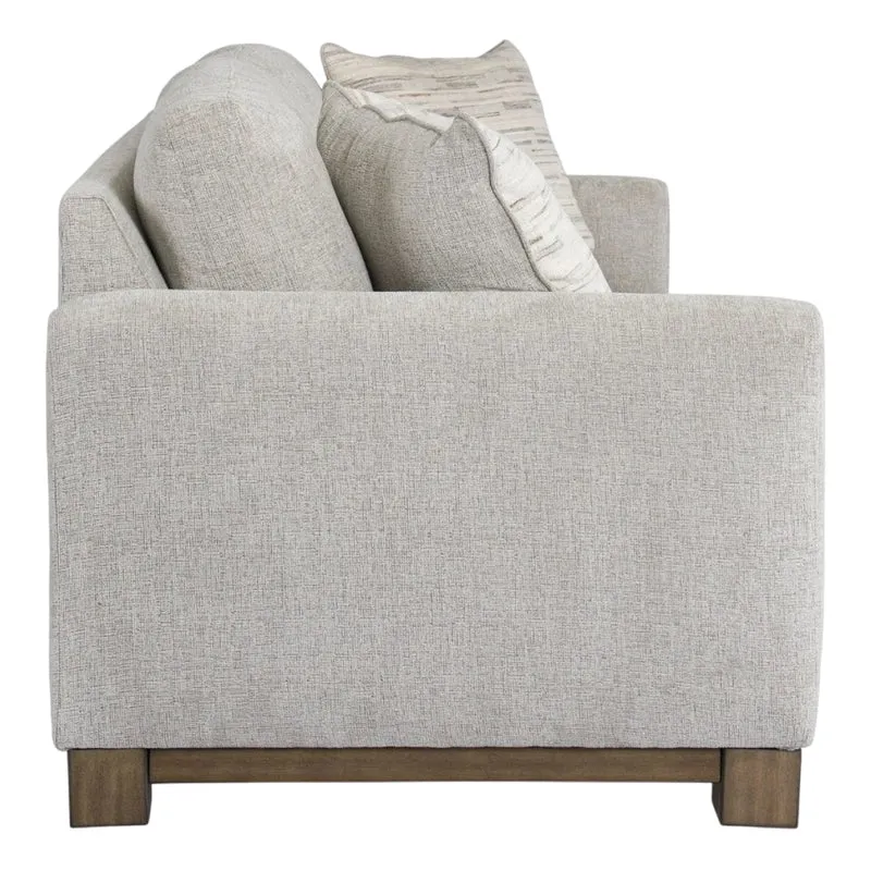 Sofa condo en tissu gris pâle avec coussins - MarinaMae