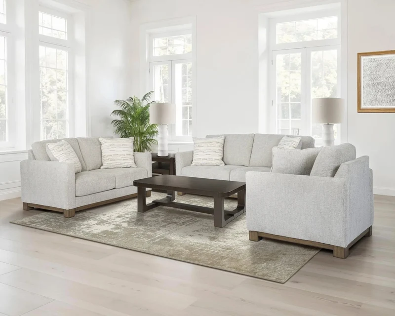 Sofa condo en tissu gris pâle avec coussins - MarinaMae