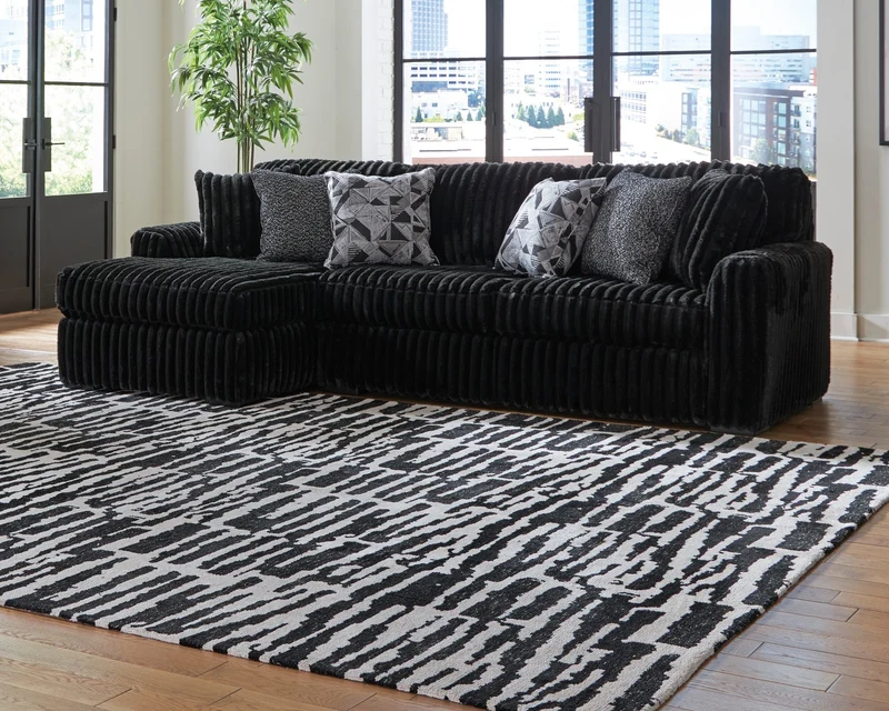 Sofa en velours côtelé noir avec chaise longue & coussins - Gabbyleigh