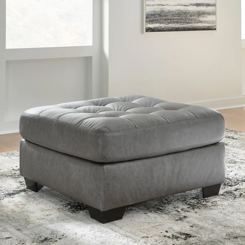 Ottoman surdimensionné aspect cuir gris - Clairette Court