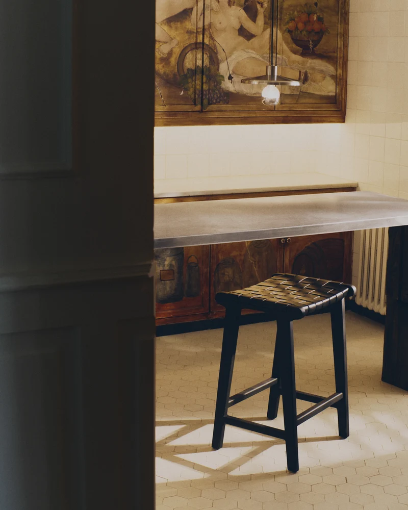 Calixta stool in leather and solid mahogany wood with black finish 67 cm