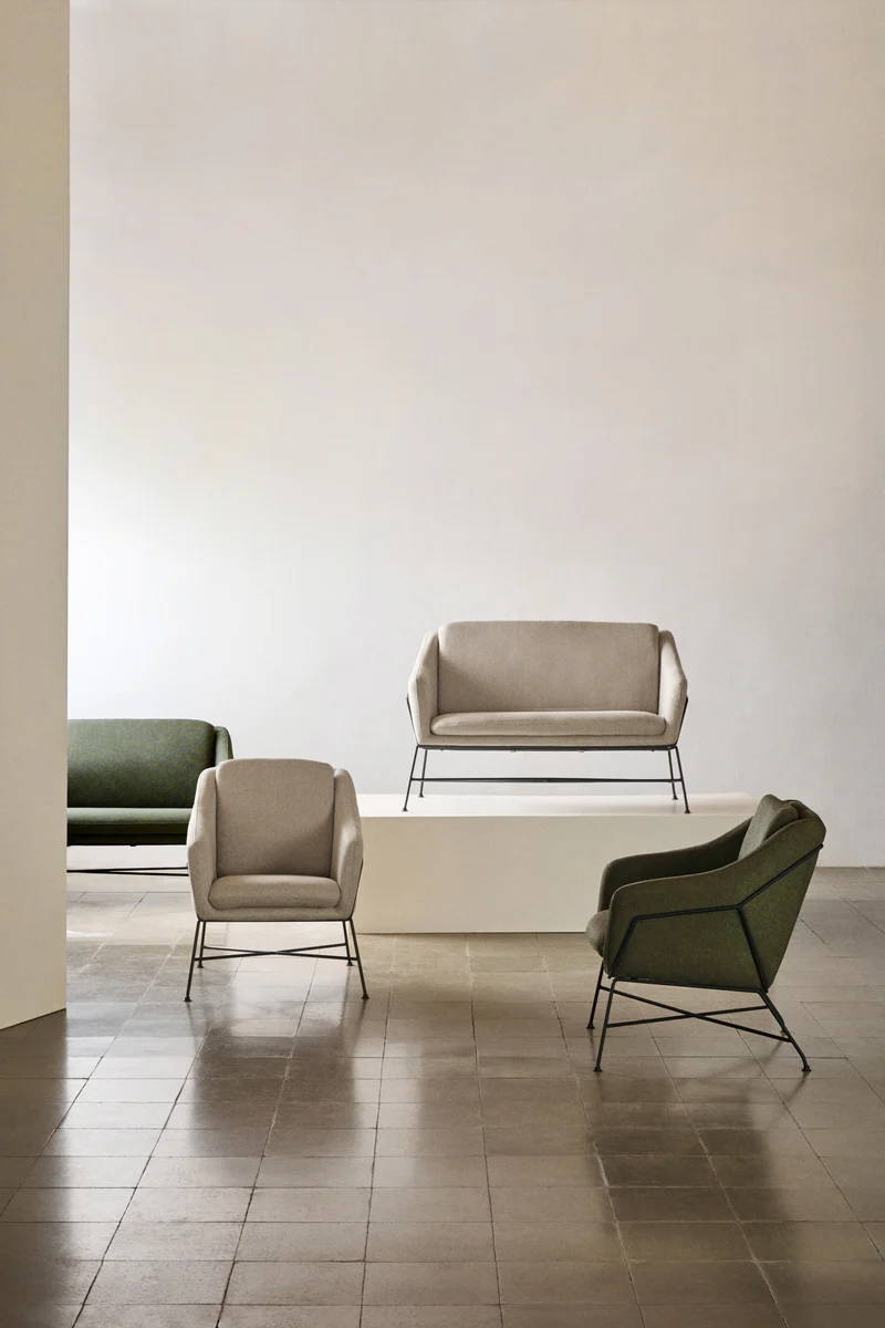 Brida armchair in green and steel legs with black finish
