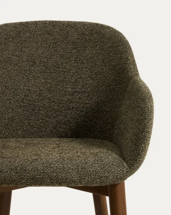 Meila chair with armrests in green chenille with legs in walnut finish.