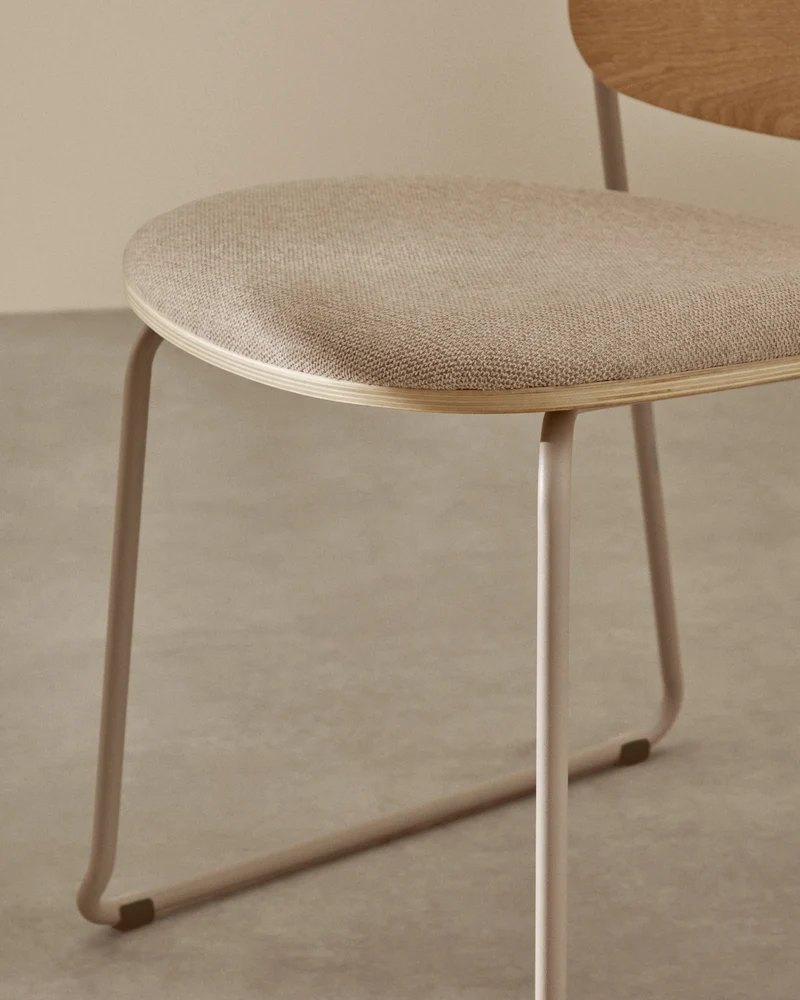Meli stackable chair in poplar plywood with beige chenille seat and beige metal legs