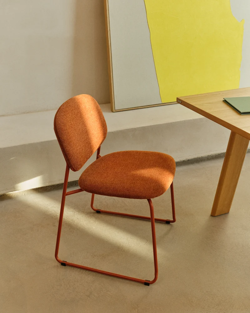Meli stackable chair in terracotta chenille with terracotta metal legs