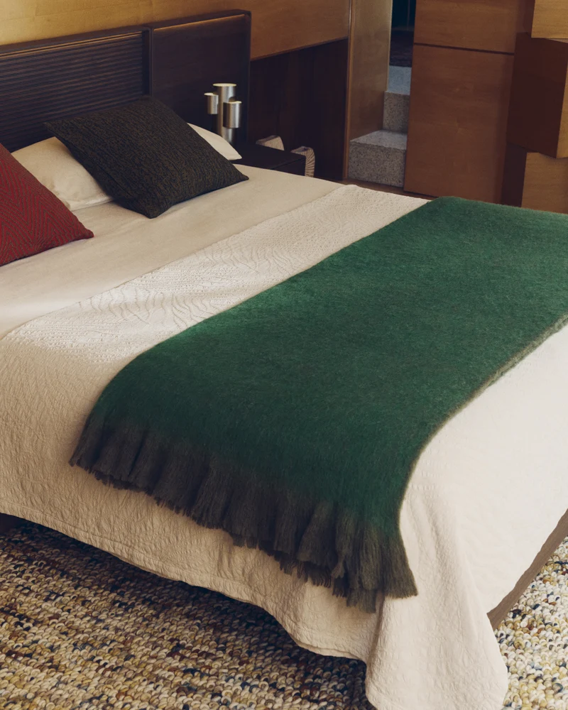 Odelna wool and acrylic throw with ruffles in green 130 x 170 cm