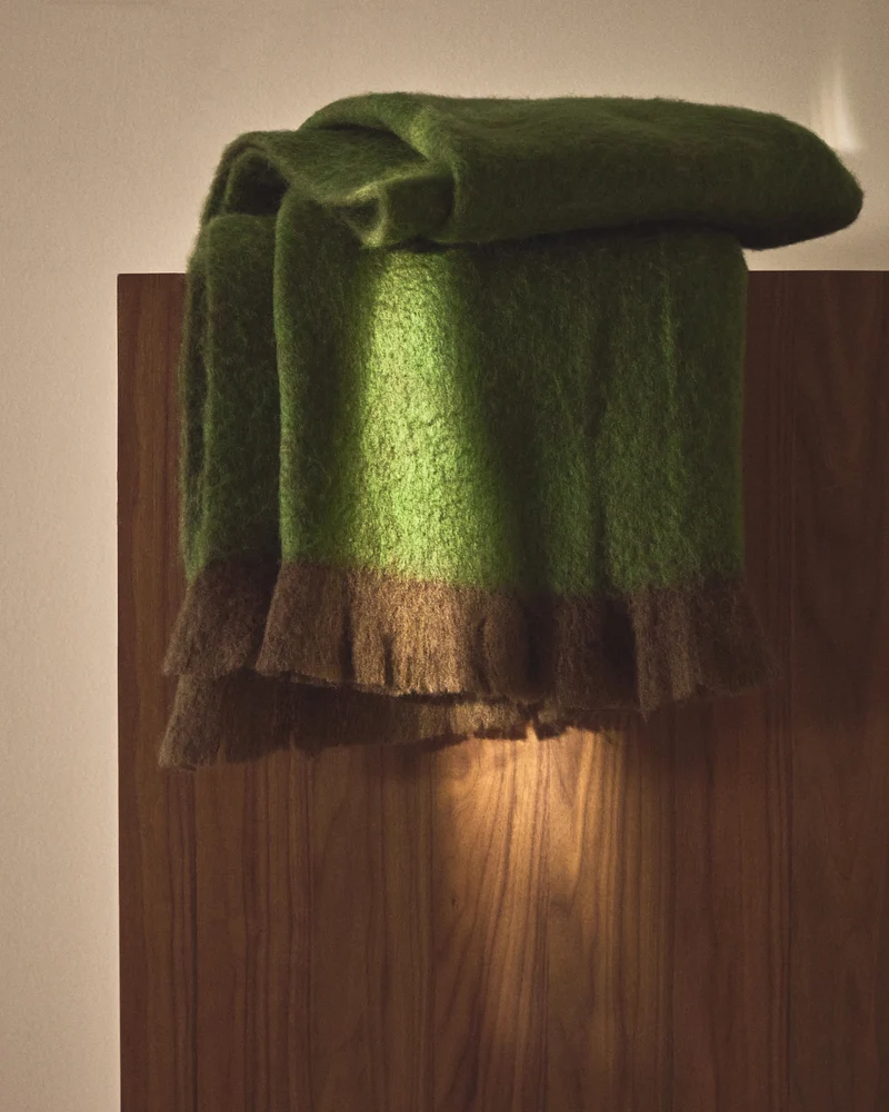 Odelna wool and acrylic throw with ruffles in green 130 x 170 cm
