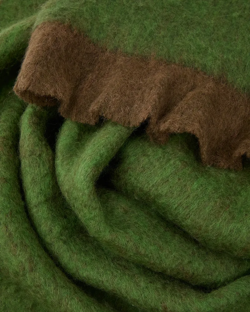 Odelna wool and acrylic throw with ruffles in green 130 x 170 cm