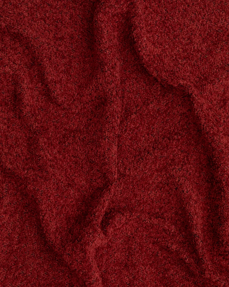 Club burgundy bouclé armchair
