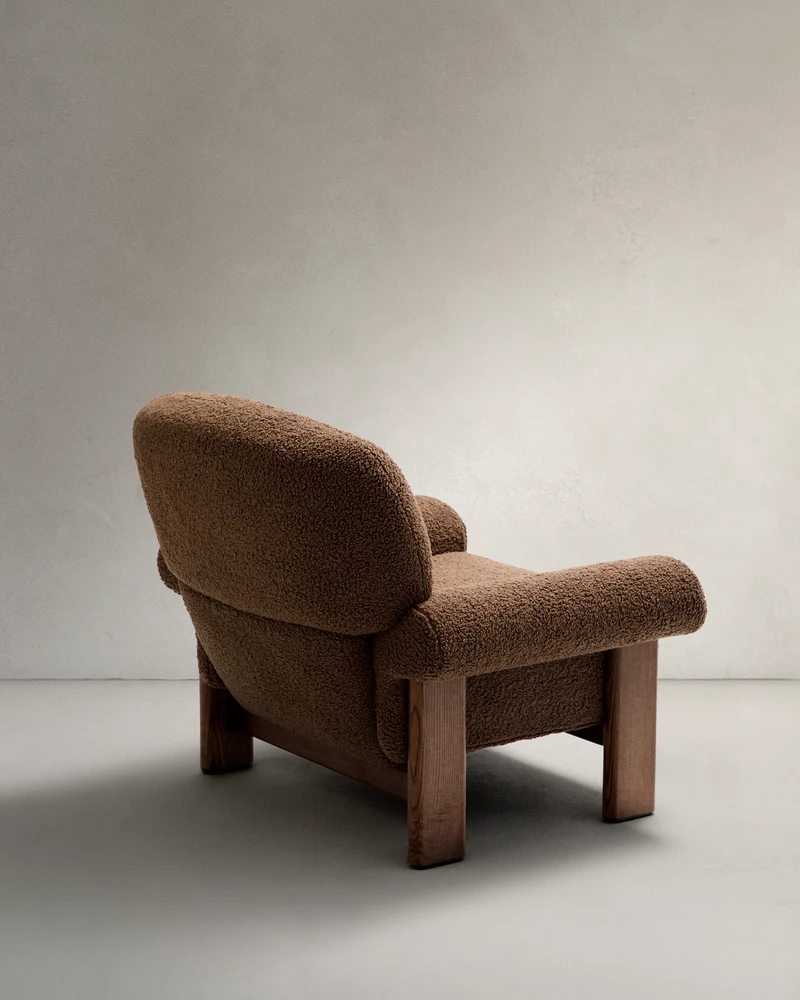 Nema armchair in taupe bouclé with solid ash wood legs in a walnut finish FSC 100%