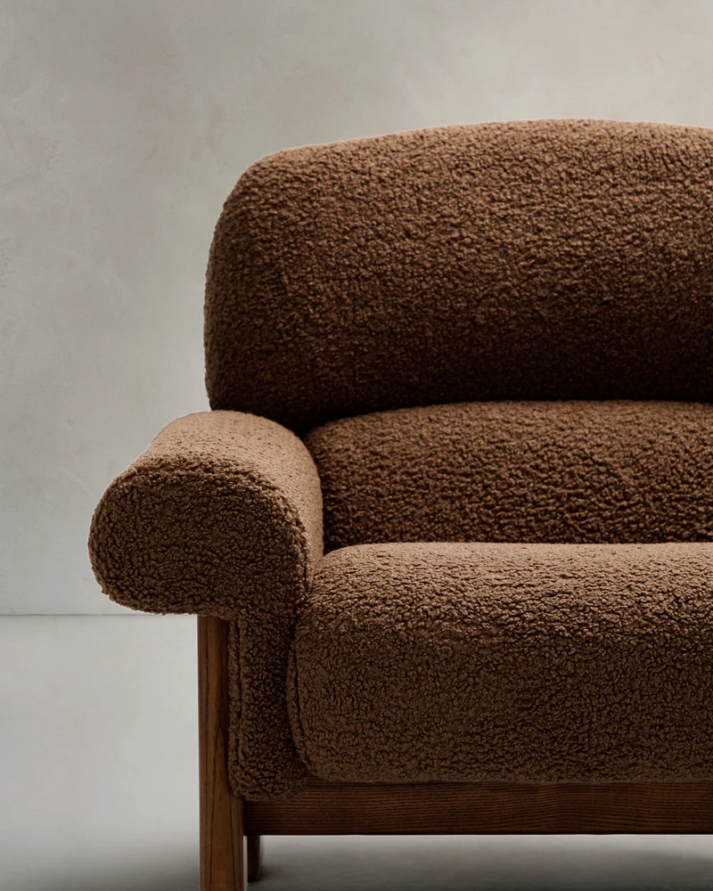 Nema armchair in taupe bouclé with solid ash wood legs in a walnut finish FSC 100%