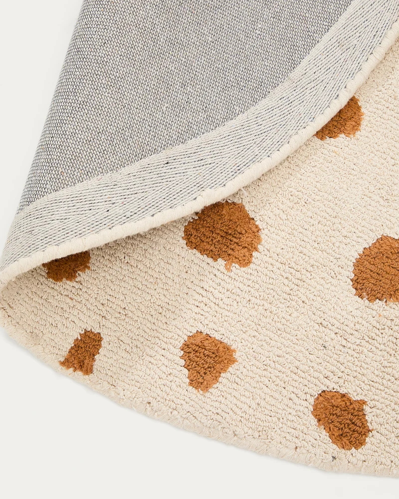 Tandani beige cotton round rug with orange cheetah design Ø 100cm