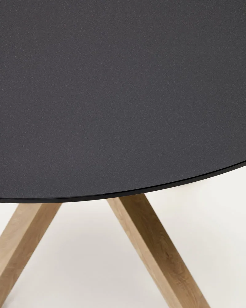 Argo round table in frosted black glass and wood effect steel legs, Ø 120 cm