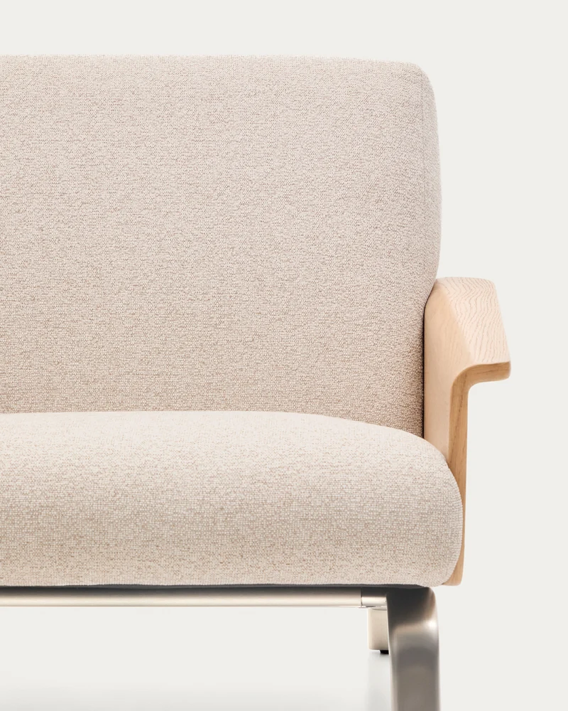 Amsen beige armchair in oak plywood with legs in brushed stainless steel