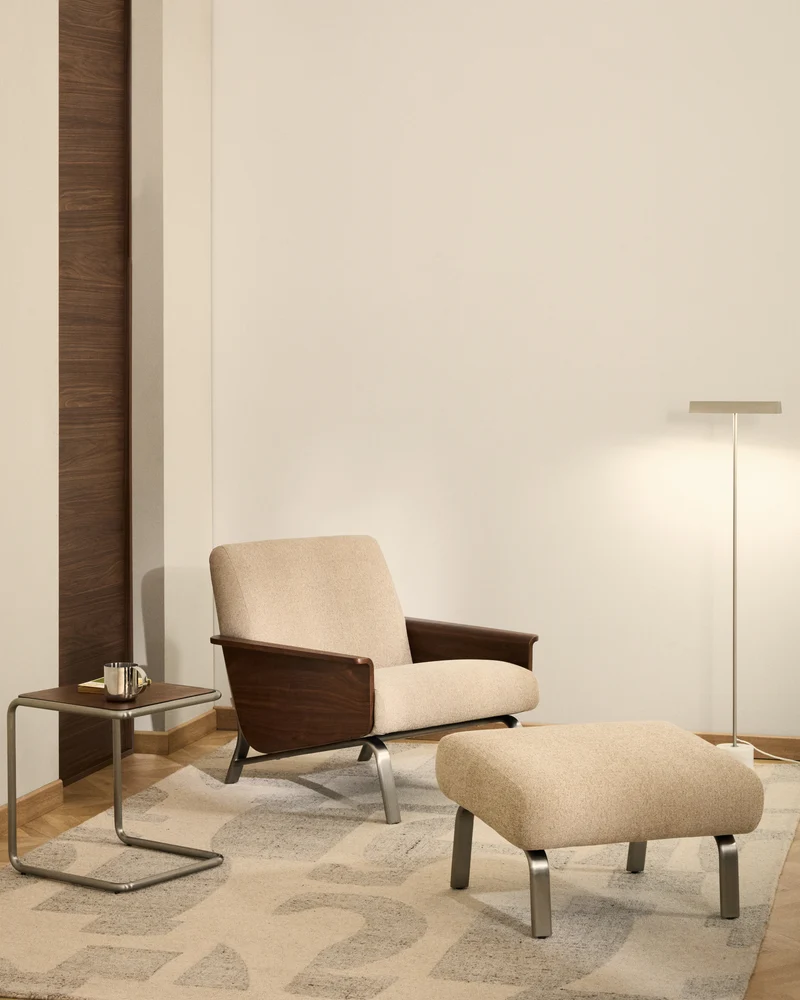 Amsen light brown armchair in walnut plywood with legs in brushed stainless steel