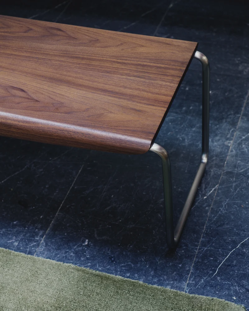 Tarsel bench in walnut veneer with brushed stainless steel structure 142cm