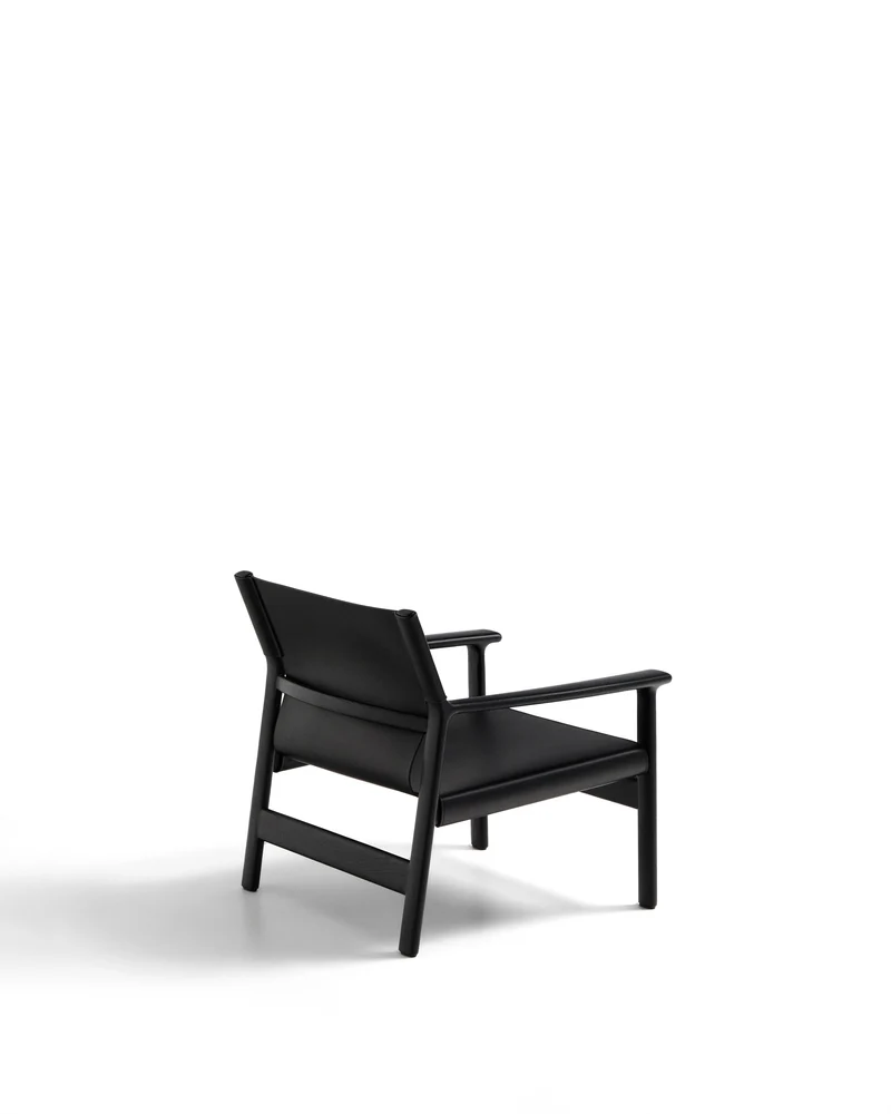 Jan armchair made of black recycled leather fibres and FSC 100% solid ash wood with black finish