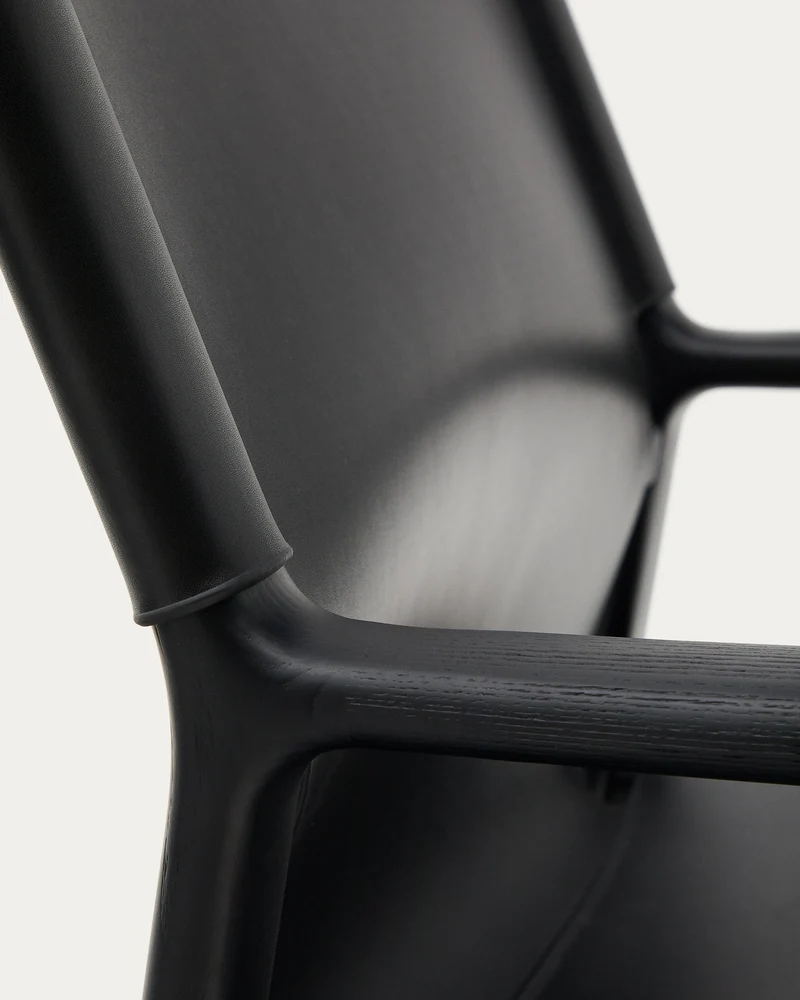 Jan armchair made of black recycled leather fibres and FSC 100% solid ash wood with black finish