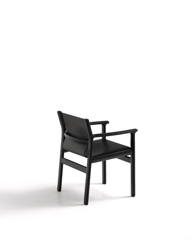 Jan chair made of black recycled leather fibres and FSC 100% solid ash wood with black finish