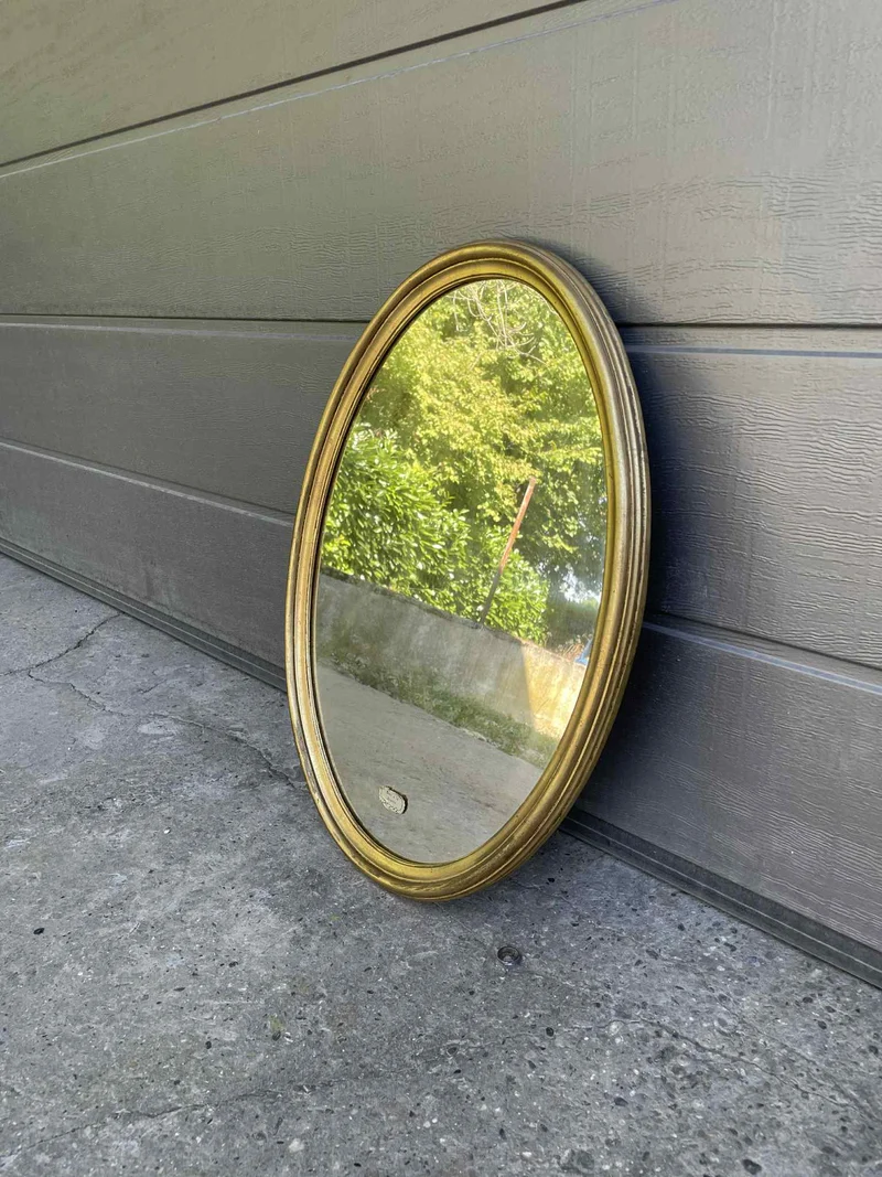 Miroir ovale doré