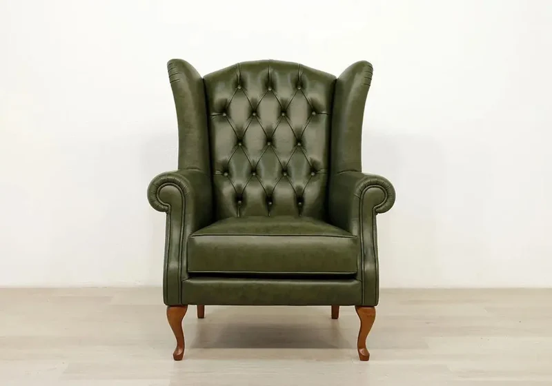 Fauteuil bergère vintage en cuir vert - Chesterfield