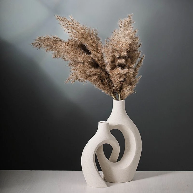 Vase en ceramique, 11,5x5,9xH15,5cm et 9,2x5,7xH12cm
