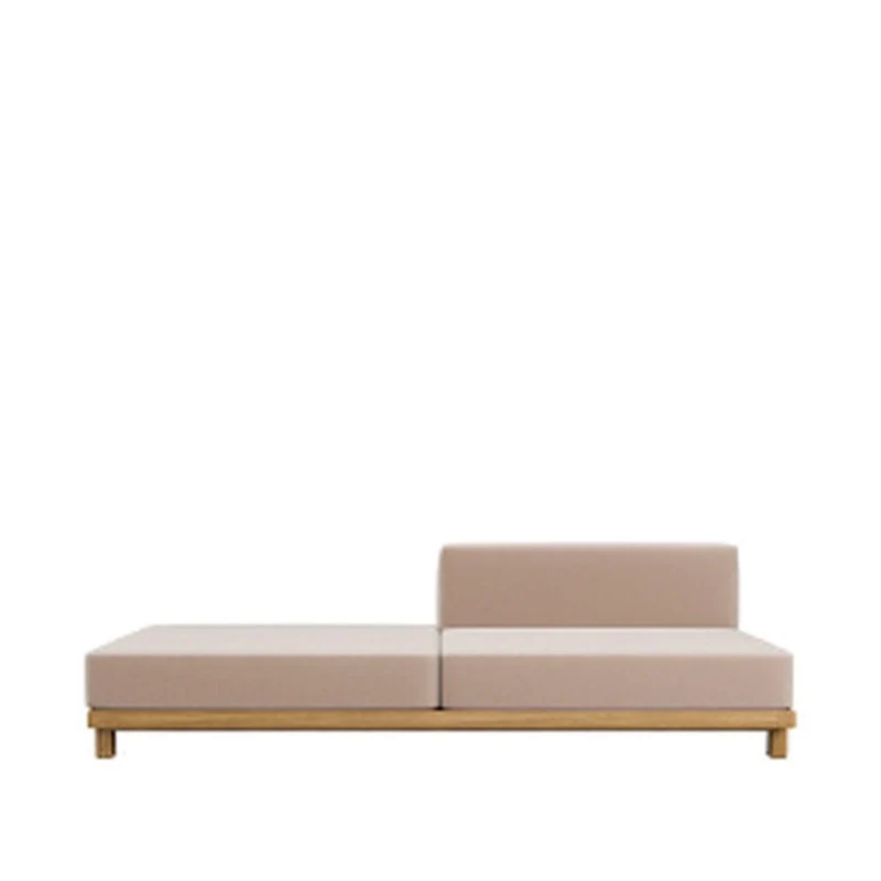 Canapé vis un tabouret d'extension à droite