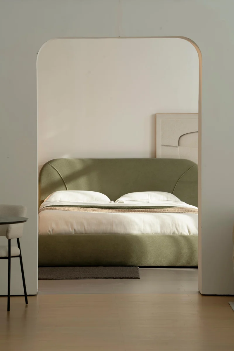 Lit en tissu vert avec sommier Softy