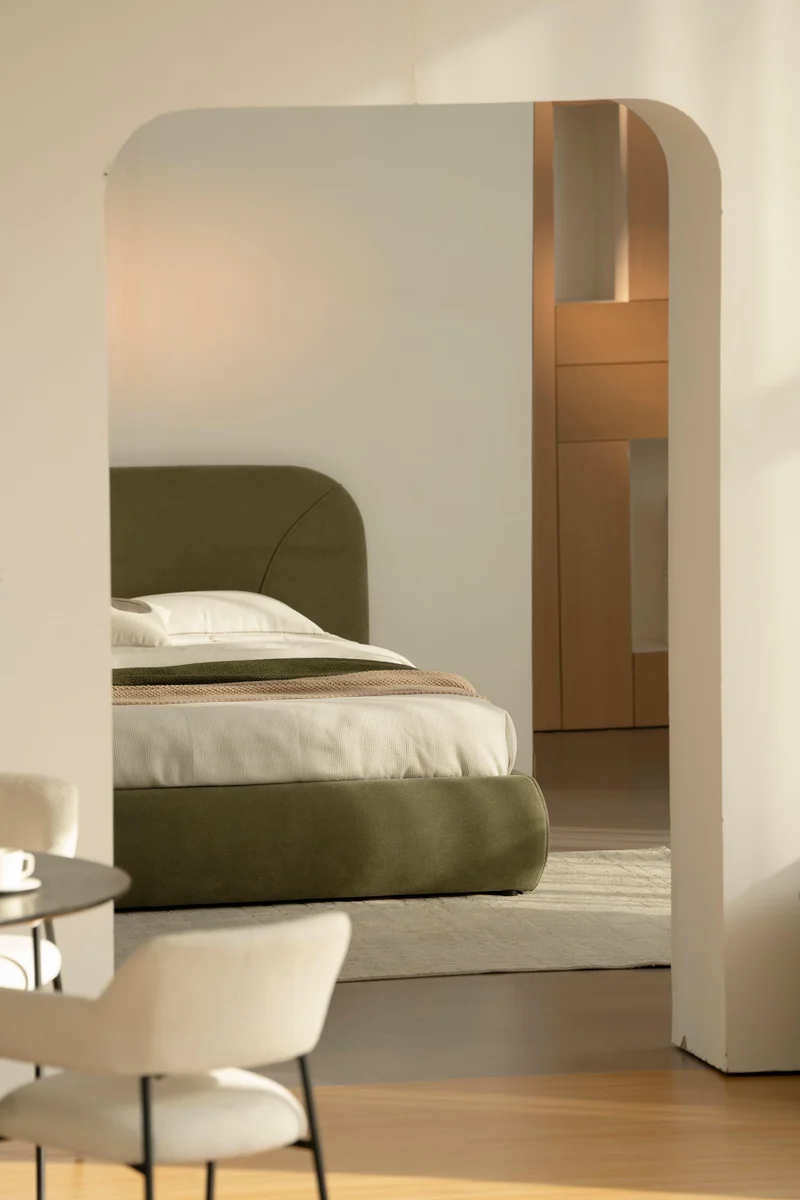 Lit en tissu vert avec sommier Softy