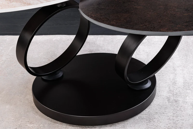 Table basse design DANCING RINGS rouille ronde tournante en céramique travertin structure noire