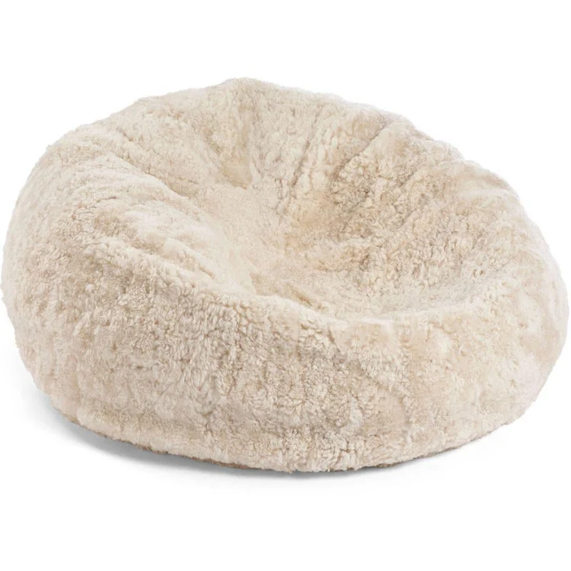 Pouf en peau d'agneau Merino Laine M