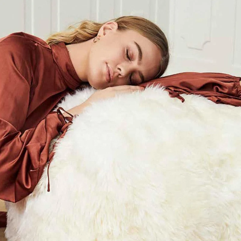 Pouf en peau d'agneau Merino Laine M