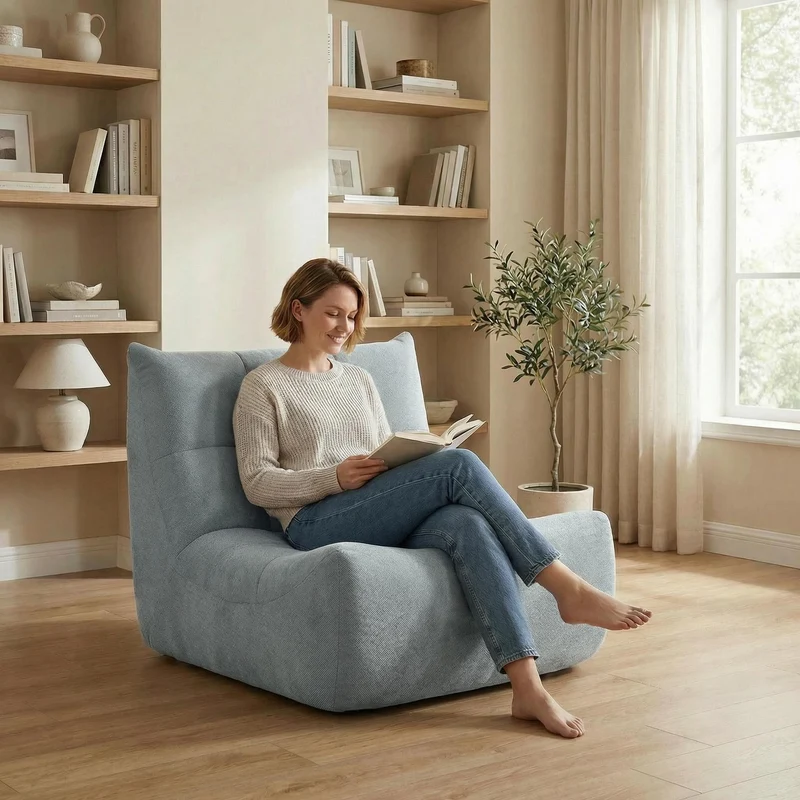 Fauteuil chauffeuse capitonné en tissu chenille gris, mousse mémoire CALCIUMCASCADE